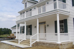 Porch posts and railings by L & J Pool, Fence & Deck Company