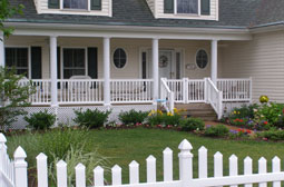Porch posts and railings by L & J Pool, Fence & Deck Company