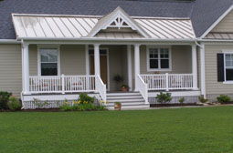 Porch posts and railings by L & J Pool, Fence & Deck Company