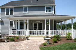 Porch posts and railings by L & J Pool, Fence & Deck Company