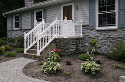 Porch posts and railings by L & J Pool, Fence & Deck Company