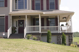 Porch posts and railings by L & J Pool, Fence & Deck Company
