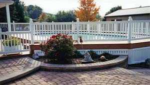 Pool, deck, fence, and garden accent project by L & J Pool, Fence & Deck Company