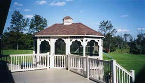 Deck posts, railings, and garden accents by L & J Pool, Fence & Deck Company
