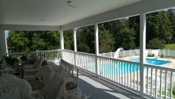 Porch project by L & J Pool, Fence & Deck Company